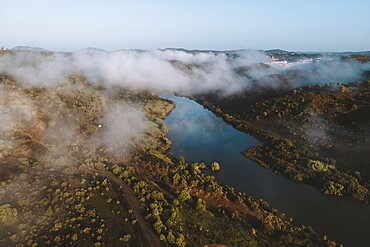 Drone shot, river course, low cloud cover
