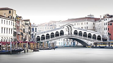 Long exposure of the Rialto Bridge on the Grand Canal in Venice, Italy