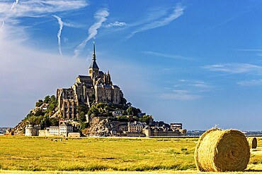 Imposing view of Mont Saint-Michel with a bale of straw in the foreground, Mont Saint Michel in Normandy, France