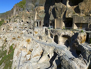 Ancient cave city with branching paths and stairs embedded in the rocky landscape, aerial view, cave city, cave monastery, Vardzia, Vardzia, Samtskhe-Javakheti region, Samtske Javakheti, Lesser Caucasus, Georgia