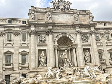 Magnificent baroque Trevi Fountain with detailed sculptures, Rome, Italy