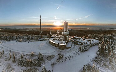 Winter landscape with atmospheric sunset. Großer Feldberg in the Taunus, Hesse, Germany