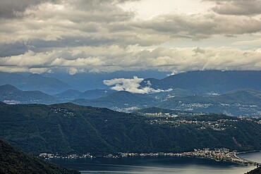 Beautiful Aerial View over City and Lake Lugano and Mountain in the Swiss Alps with Clouds in a Cloudy Day in Autumn in Lugano, Ticino, Switzerland