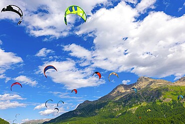 Kite Sail on Alpine Lake Silvaplana in a Sunny Summer Day with Mountain View in the Swiss Alps in Silvaplana, Maloja, Grisons, Switzerland