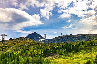 Overhead Cable Car with Mountain View in the Swiss Alps in a Sunny Summer Day in Bernina, Valposchiavo, Pontresina, Grisons, Switzerland
