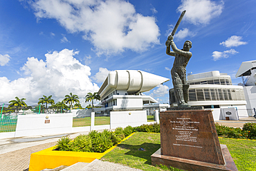 Garfield Sobers statue and The Kensington Oval Cricket Ground, Bridgetown, St. Michael, Barbados, West Indies, Caribbean, Central America