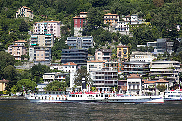 Paddleboat on lake, Como, Lake Como, Lombardy, Italian Lakes, Italy, Europe