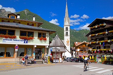 Church and hotel, Alleghe, Belluno Province, Veneto, Dolomites, Italy, Europe