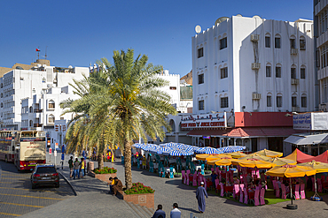 Evening view of restaurants on the Corniche at Muttrah, Muscat, Oman, Middle East