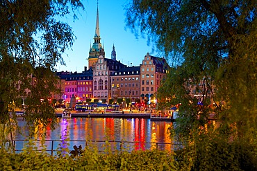 Gamla Stan and Riddarholmen with spire of Riddarholmskyrkan (Riddarholmen Church) at dusk, Stockholm, Sweden, Scandinavia, Europe