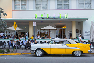 View of Art Deco architecture of Avalon Hotel and classic car, South Beach, Miami Beach, Miami, Florida, United States of America, North America