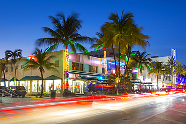 Ocean Drive restaurants and Art Deco architecture at dusk, South Beach, Miami Beach, Miami, Florida, United States of America, North America