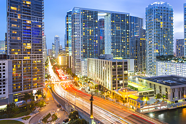 View from Rooftop bar overlooking traffic on Birckell Avenue at dusk, Miami, Florida, United States of America, North America
