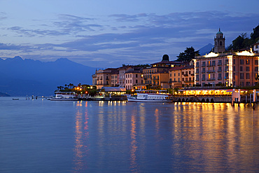 Promenade and lake at dusk, Bellagio, Lake Como, Lombardy, Italian Lakes, Italy, Europe