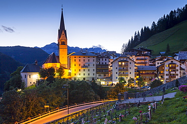 Church and village of Pieve Di Livinallongo at dusk, Province of Belluno, Dolomites, Italy, Europe