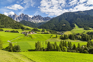 View of Church and mountain backdrop, Val di Funes, Bolzano Province, Trentino-Alto Adige/South Tyrol, Italian Dolomites, Italy, Europe