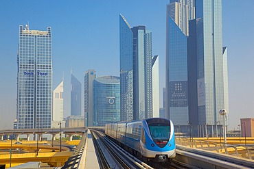 Metro and skyscrapers on skyline, Dubai, United Arab Emirates, Middle East