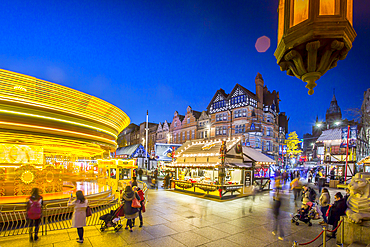 Christmas Market, Carousel and lamp on Old Market Square at dusk, Nottingham, Nottinghamshire, England, United Kingdom, Europe