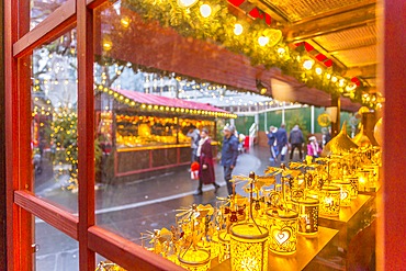 Christmas Market Stalls and shoppers in Leicester Square, London, England, United Kingdom, Europe