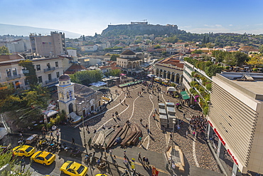 Elevated view of taxis, shoppers and Greek Orthodox Church in Monastiraki Square, Acropolis visible in background, Monastiraki District, Athens, Greece, Europe