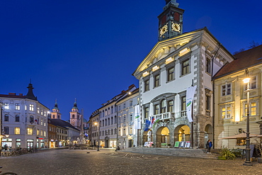 View of Cathedral of St. Nicholas and Town Hall at dusk, Ljubljana, Slovenia, Europe