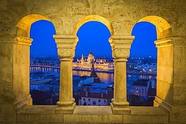 View of Parliament Building from Fisherman's Bastion at dusk, Buda Castle Hill, Budapest, Hungary, Europe