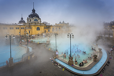 View of outside thermal spa at Szechenhu Thermal Bath in winter, Budapest, Hungary, Europe