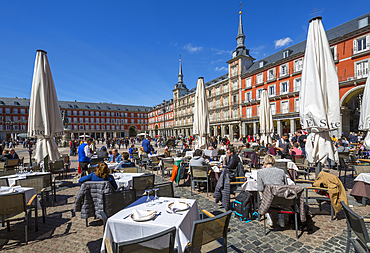 View of Al Fresco restaurants and architecture in Calle Mayor, Madrid, Spain, Europe