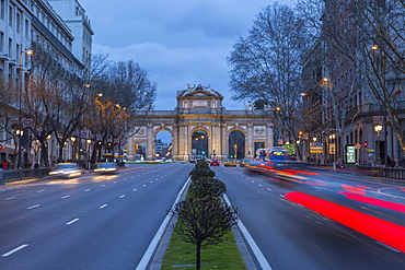 View of Triomphal Arch (Puerta de Alcala) in Plaza de la Independencia at dusk, Madrid, Spain, Europe