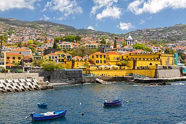 View of fishing boats in harbour and St. James Fort, Funchal, Madeira, Portugal, Atlantic, Europe