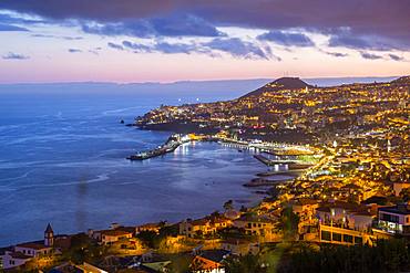 View of Funchal harbour and town at dusk, Funchal, Madeira, Portugal, Atlantic, Europe