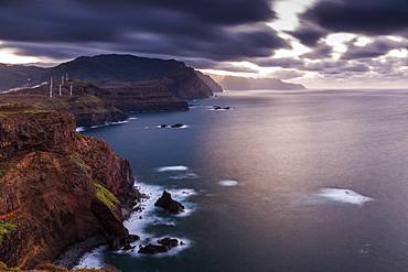 Rocky coast at the Ponta da Sao Lourenco and spring flowers at sunset, Eastern tip of the island, Madeira, Portugal, Atlantic, Europe