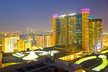 Grand Millennium Hotel and Al Wahda Mall at dusk, Abu Dhabi, United Arab Emirates, Middle East