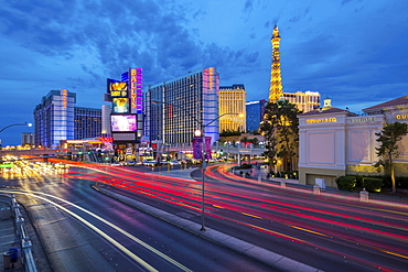 View of the Paris Eiffel Tower and Ballys Hotel and Casino at dusk, The Strip, Las Vegas Boulevard, Las Vegas, Nevada, United States of America, North America