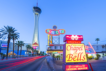 View of Chapel of the Bells and Stratosphere Tower at dusk, The Strip, Las Vegas Boulevard, Las Vegas, Nevada, United States of America, North America