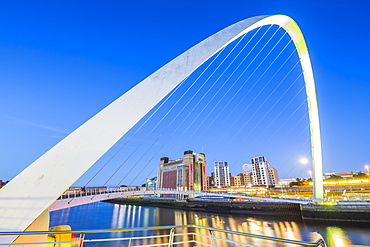 View of Tyne River and Gateshead Millennium Bridge at dusk, Newcastle-upon-Tyne, Tyne and Wear, England, United Kingdom, Europe