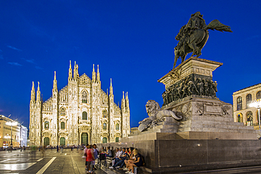 View of Duomo di Milano illuminated in Piazza Del Duomo at dusk, Milan, Lombardy, Italy, Europe