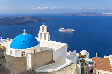 Blue dome and belltower of the church of St. Gerasimos, Firostefani, Fira, Santorini, Cyclades, Greek Islands, Greece, Europe
