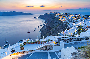 View of Oia village at sunset, Santorini, Cyclades, Aegean Islands, Greek Islands, Greece, Europe