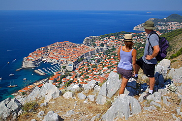 View of Old Town, UNESCO World Heritage Site, and walkers, Dubrovnik, Dubrovnik Riviera, Dalmatian Coast, Croatia, Europe