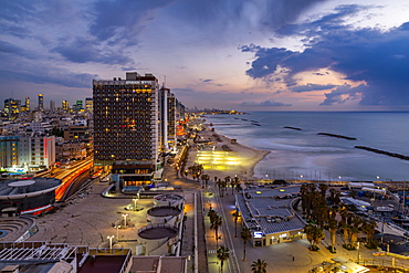 Elevated view of the beaches and hotels at dusk, Jaffa visible in the background, Tel Aviv, Israel, Middle East