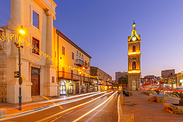 View of The Clock Tower and trail lights at dusk, Jaffa Old Town, Tel Aviv, Israel, Middle East
