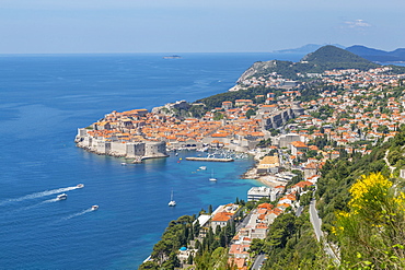 View of Old Walled City of Dubrovnik, UNESCO World Heritage Site, and Adriatic Sea from elevated position, Dubrovnik Riviera, Croatia, Europe