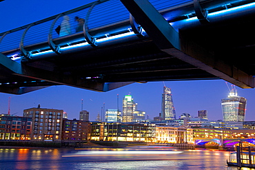 River Thames, Millennium Bridge and City of London skyline at dusk, London, England, United Kingdom, Europe 