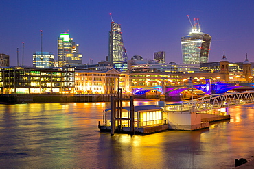 River Thames and City of London skyline at dusk, London, England, United Kingdom, Europe 