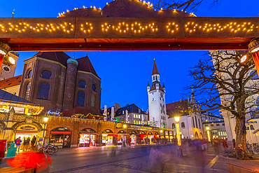 View of Old Town Hall and entrance to Viktualienmarkt Christmas Market at dusk, Munich, Bavaria, Germany, Europe
