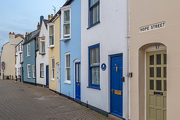 View of colourful houses overlooking the Old Harbour and quayside houses at dusk, Weymouth, Dorset, England, United Kingdom, Europe