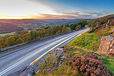 View of car trail lights from Surprise View at sunset, Millstone Edge, Derbyshire Peak District, Derbyshire, England, United Kingdom, Europe