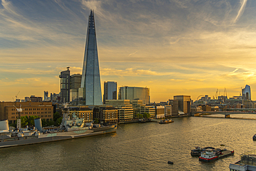 View of The Shard, HMS Belfast and River Thames from Cheval Three Quays at sunset, London, England, United Kingdom, Europe