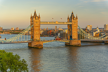View of Tower Bridge and River Thames from Cheval Three Quays at sunset, London, England, United Kingdom, Europe